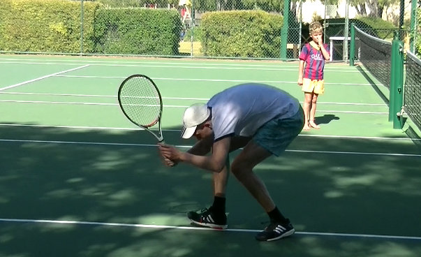 Ben playing tennis