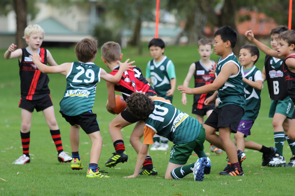 Alex, Cambell and Jordan tackling an Attadale player