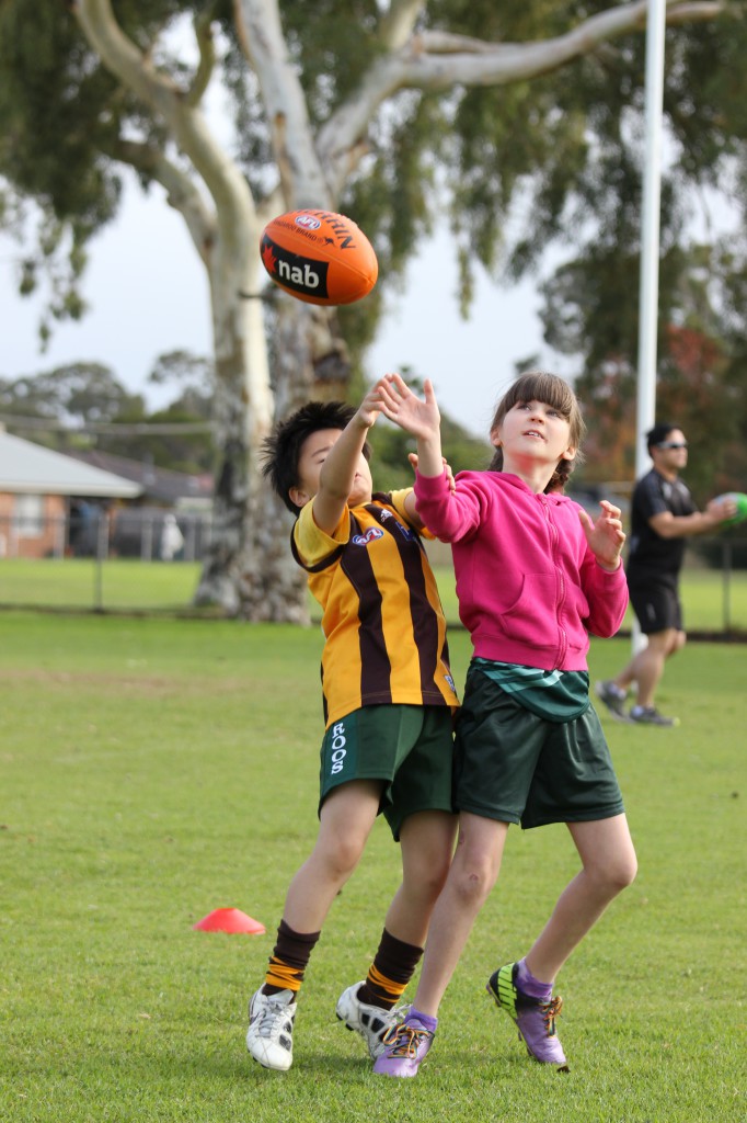 Jayden and Amelie compete for a mark