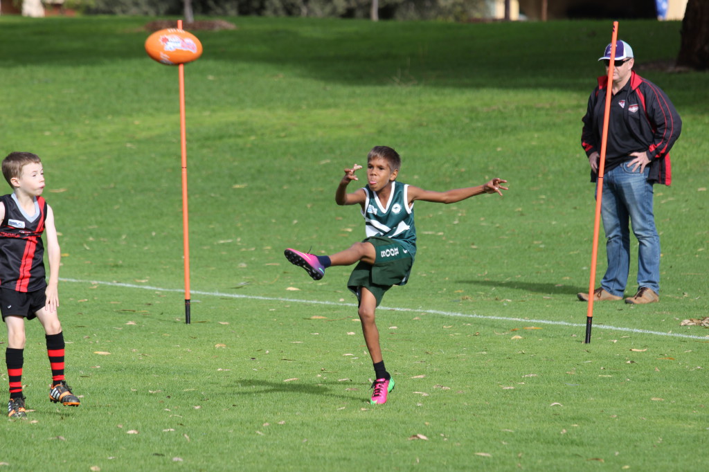 Matthew kicking a torpedo punt